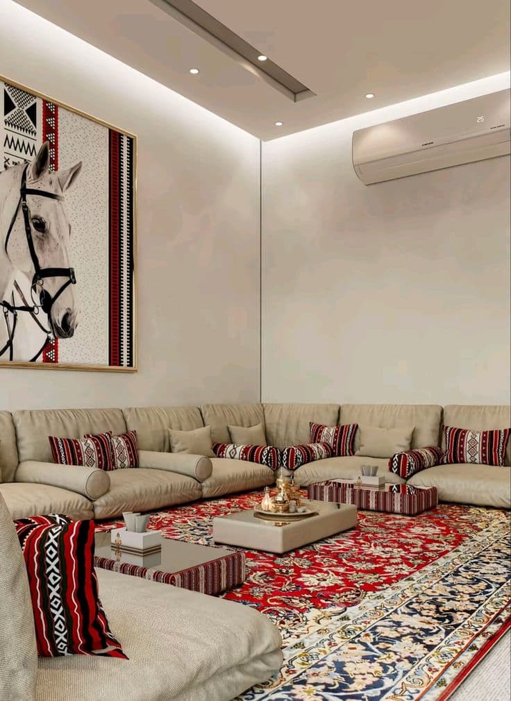 An opulent Arabic majlis with rich cushions and patterned rugs